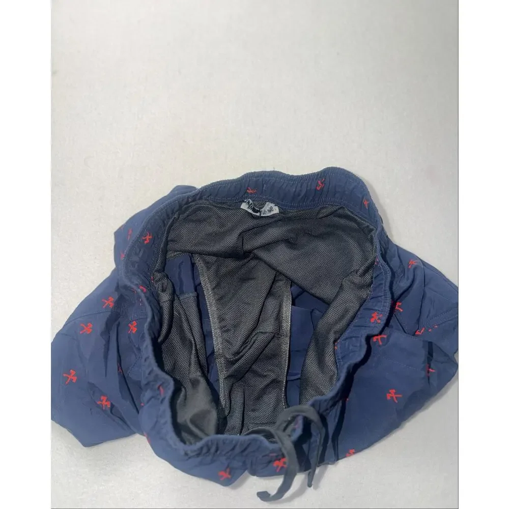 The north face men’s navy & red swimming trunks